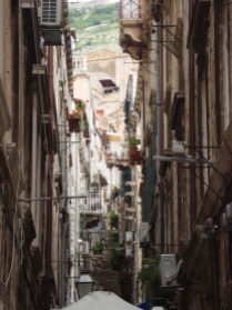 View through an alleway to the streets above