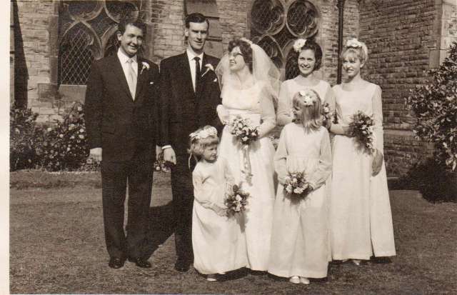 Wedding Photograph.  Me as a five year old directly in front of my uncle with my dad to my left as you look at the photo.  The other bridesmaid that I met at the weekend is the lovely lady behind me with the dark hair, to the right of my auntie. (c) courtesy of Elisabeth Nelson 2014